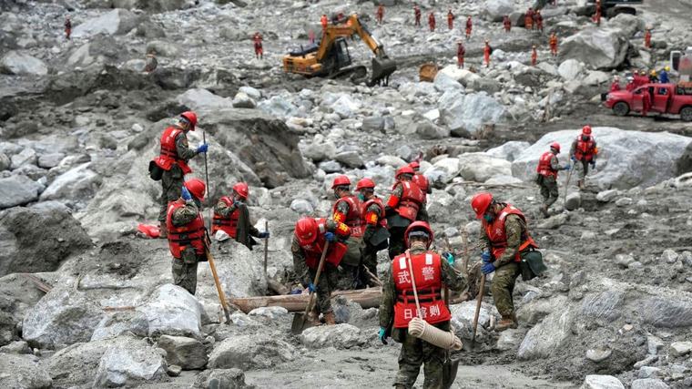 China recovers 12 more bodies from mudslide-hit Nepal border crossing
