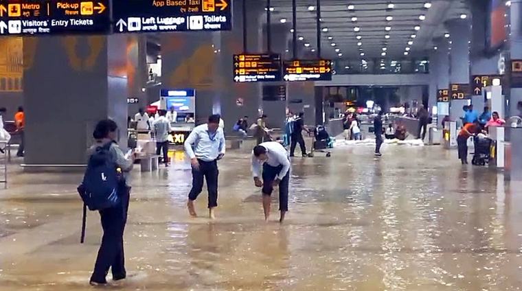 Delhi rain disrupts flights, waterlogs airport as IMD warns of intense showers