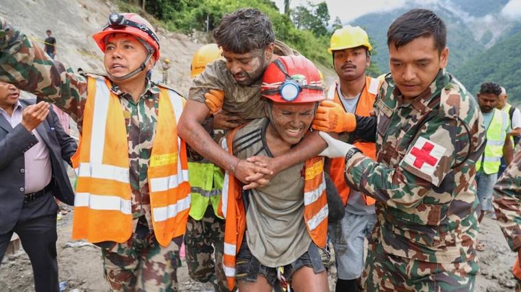 2 rescued from Nepal hydropower tunnel 9 days after floods, contact established with others
